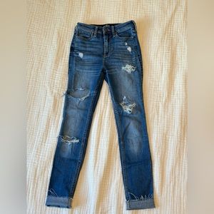 Hollister blue ripped skinny jeans in size 24 (0)